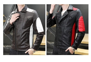 Detail view of motorcycle jacket showing quilted shoulder pads and zipper pocket texture