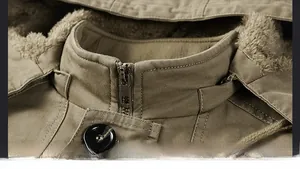 Detail of khaki jacket collar featuring durable twill cotton and warm fleece lining