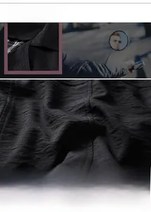 Detail of dark gray men's casual jacket showing textured fabric and plaid lining detail
