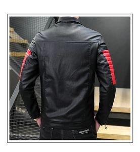 Detail of men's leather jacket featuring red quilted arm panels and stand collar