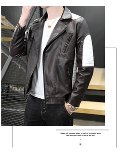 Close-up of brown PU biker jacket with white quilted shoulders and metallic zipper details