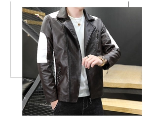 Close-up of brown faux leather moto jacket with white contrast shoulder panels