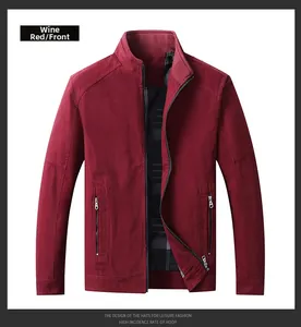 Detail of burgundy casual jacket with stand collar and zipper side pockets with check lining