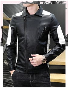 Close-up of black and white biker jacket featuring premium PU leather and metallic zippers