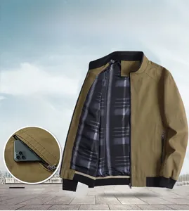 Detail of men's casual cotton jacket showing secure zipper pocket and ribbed cuffs