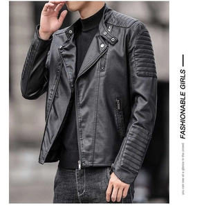 Close-up of black biker jacket with parallel quilted stitching on sleeves and shoulders
