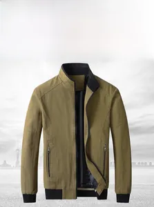 Detail view of khaki cotton jacket showing stand collar and striped inner lining