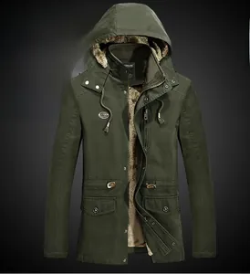 Detail view of army green hooded parka jacket with warm faux fur lining and utility pockets