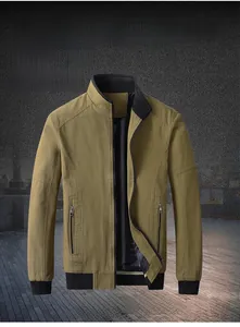 Close-up of military green jacket featuring ribbed collar and vertical zipper pockets