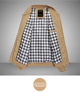 Detail of khaki cotton jacket showing black and white checkerboard lining and collar label