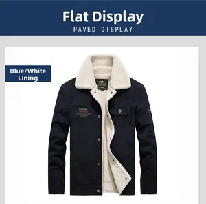 Detail of navy blue cargo jacket showing thick white fleece lining and outdoor embroidery
