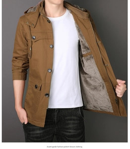 Detail of men's winter hooded jacket with thick fleece lining and durable canvas shell