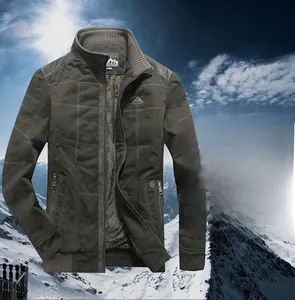 Detailed view of heavy olive green winter parka with fleece lining and ribbed cuffs
