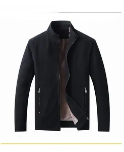 Detail of black winter jacket with warm beige fleece lining and metal zipper closure
