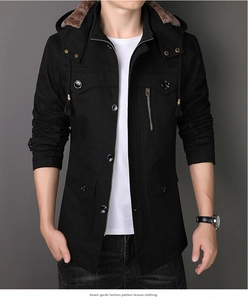 Detail of black winter parka for men with faux fur hood and multi-pocket design