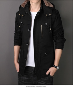 Close-up of men's winter parka with brown faux fur hood and multiple cargo pockets