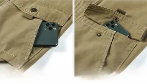 Detail view of khaki cotton jacket showing flap pocket with metal snap button and stitching