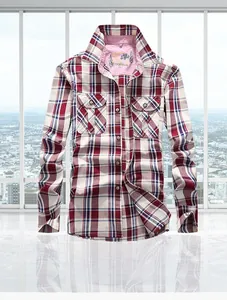 Detail of red and blue plaid cotton shirt featuring functional dual chest flap pockets