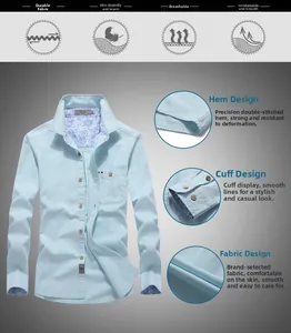 Detail of light blue shirt featuring paisley lining on cuffs and collar with chest pocket