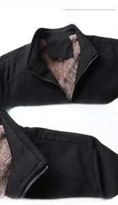 Detailed close-up of men's winter jacket showing warm fleece lining and stitching