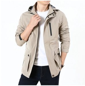 Detail view of khaki hooded jacket featuring utility pockets and fashion cuff tape