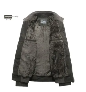 Detail view of military green winter jacket with thick grey fleece lining for warmth