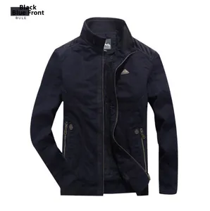 Detail of dark blue winter jacket showing stand collar fleece lining and zipper pockets