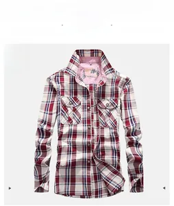 Detailed view of red and blue plaid cotton shirt with classic collar and double pockets