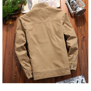 Flat lay of khaki business casual stand collar jacket on vintage wood floor back view