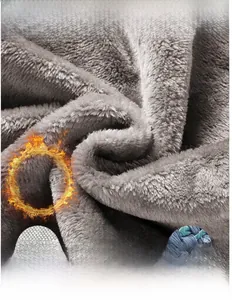 Close-up of thick dark grey fleece lining showing pure cotton texture and warmth