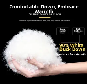 Close-up of premium 90% white duck down filling showing high loft and fluffy texture