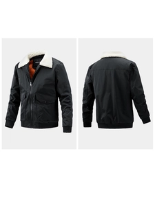 Detail view of black bomber jacket featuring white fleece collar and orange lining