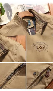 Detail view of khaki stand collar jacket featuring shoulder embroidery and plaid lining