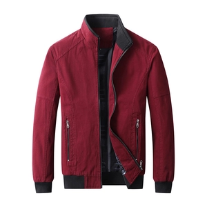 Men's burgundy cotton jacket with stand-up collar and ribbed trim on white background