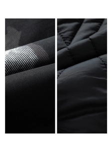 Detailed close-up showing the black quilted fabric texture and striped pattern of the coat