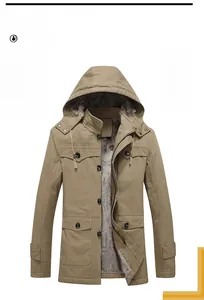Detail view of khaki winter parka showing thick grey fleece lining and windproof fabric texture