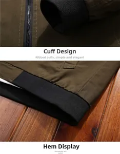 Détail d'une veste homme olive foncé montrant les poignets et l'ourlet côtelés noirs