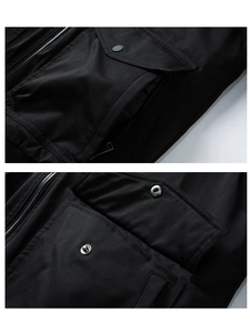 Detail of durable black jacket showing zipper, side pockets and silver metal button