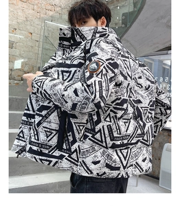 Close-up of winter puffer jacket with street style print and stand collar details