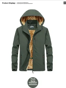 Detail of warm brown faux fur lining inside a windproof dark army green outdoor jacket