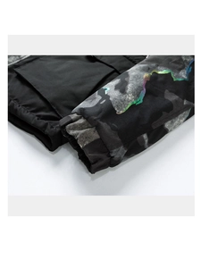 Detail of winter jacket cuff featuring camo pattern and reflective wave lines