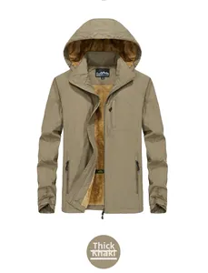Detailed view of khaki hooded jacket featuring thick yellow fleece lining for warmth