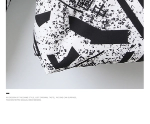 Detail of Chinese ink print and high-quality fabric on men's winter puffer jacket
