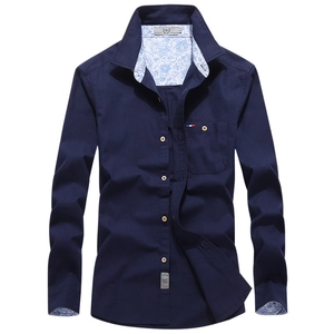 Men's navy long sleeve shirt with blue paisley pattern trim on cuffs and collar