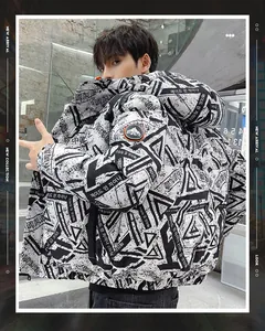 Detailed back view of a men's puffer jacket with black and white geometric print