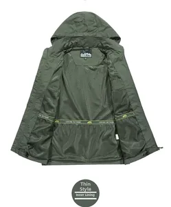 Detail view of army green outdoor jacket featuring breathable mesh lining and inner branding