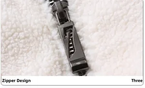 Gros plan détaillé d'une fermeture éclair en métal gris foncé avec design 7 sur veste polaire