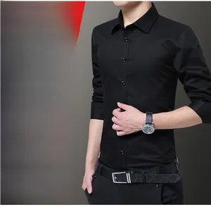 Slim fit black long sleeve dress shirt for men showing premium fabric and sleek cuffs