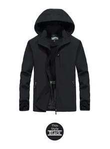 Detail view of black men's hooded outdoor jacket with zipper pockets and windproof material