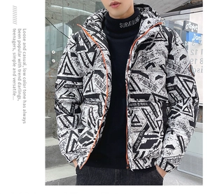 Close-up of men's winter down jacket with geometric prints and orange zipper detail